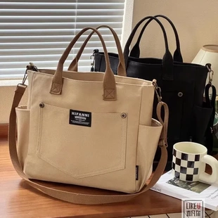 新款原创自制日系文艺加厚多口袋帆布包休闲简约手提斜挎托特包袋