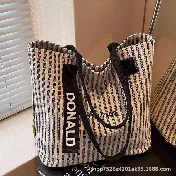 夏季条纹帆布包包女2025新款大容量上课手提袋韩系单肩通勤托特包,运动包/户外包/配件,单肩包,淘宝优惠券,粉丝福利购,淘宝优惠卷