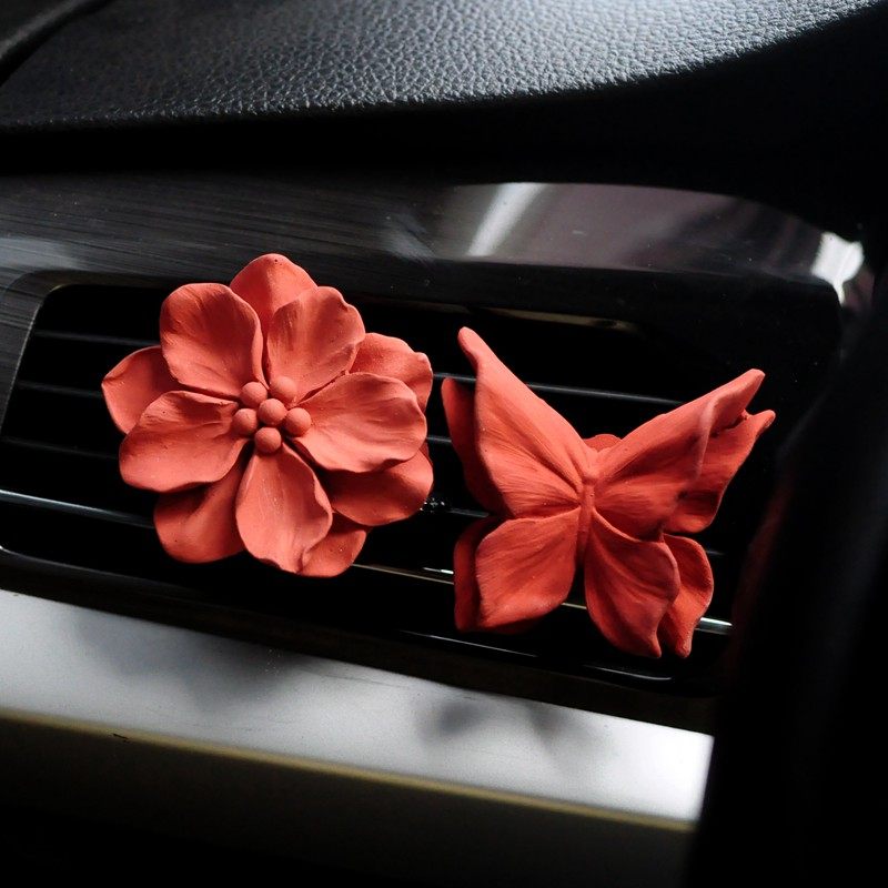 复古花朵车载出风口香薰高级感小众山茶花汽车出风口扩香石扩香器