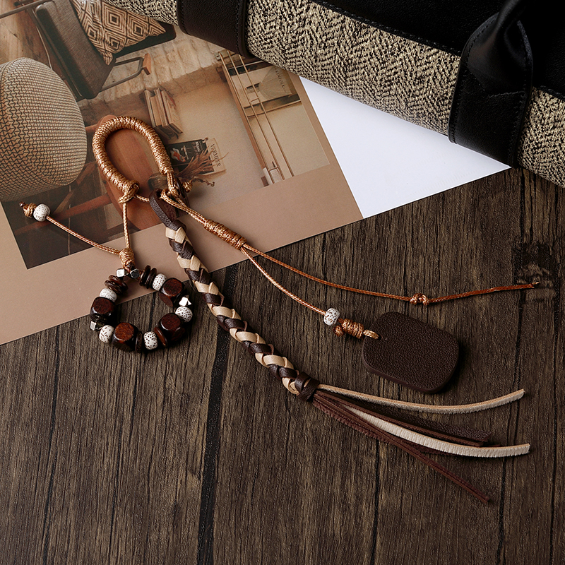 无事牌真皮包包挂件天然种子