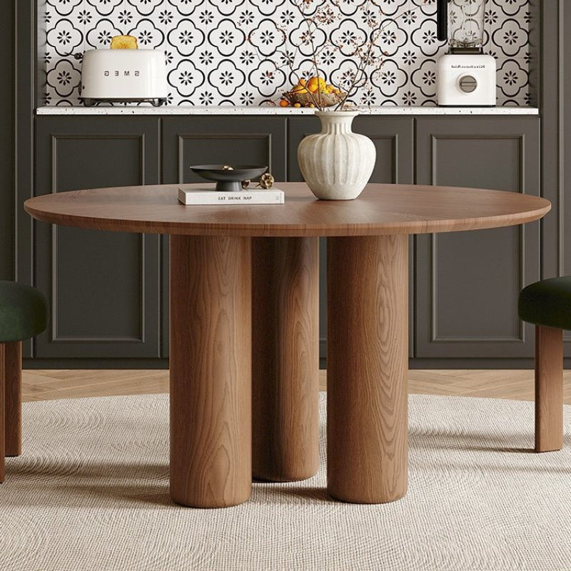北欧纯实木轻奢圆餐桌设计师个性家具简约现代原木创意家用大圆桌