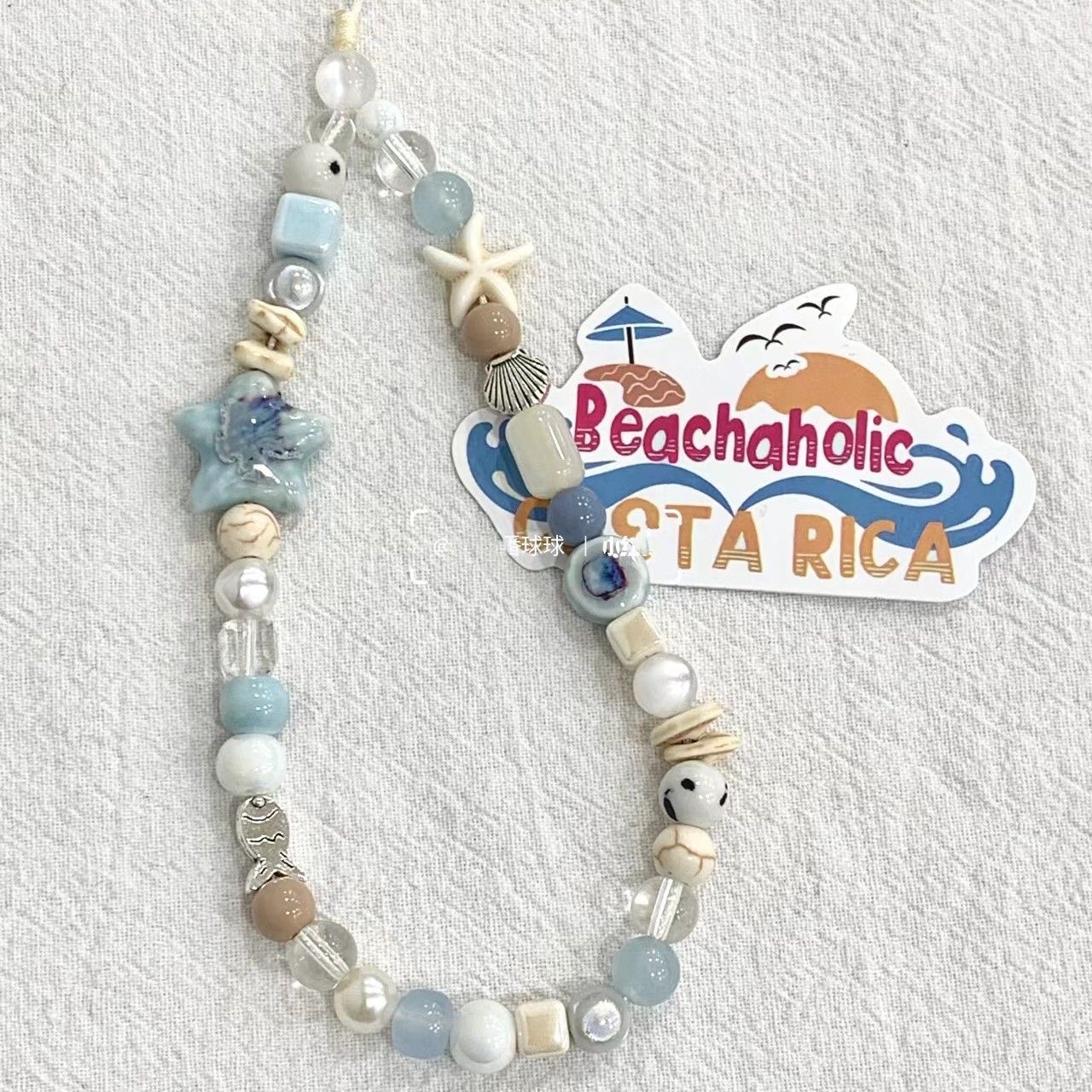 海星贝壳手机链手工diy链条短款珍珠手腕挂件高级感女款挂绳ins风