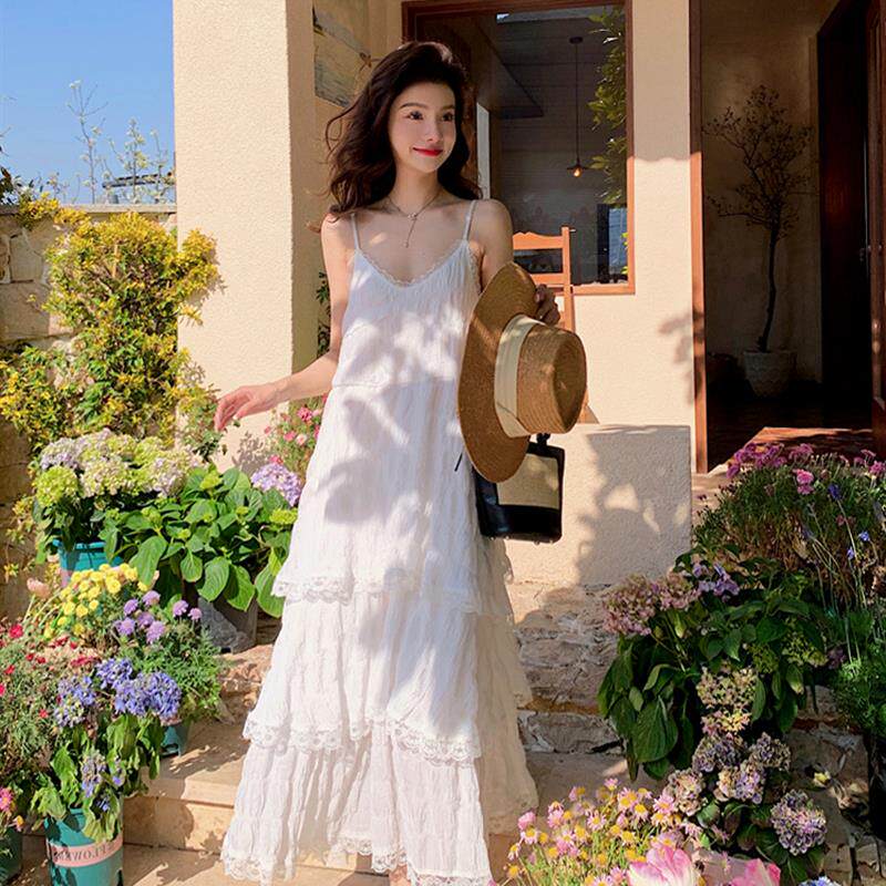 魅影仙女白色连衣裙海边度假沙滩裙高级感遮肚子减龄吊带长裙夏季