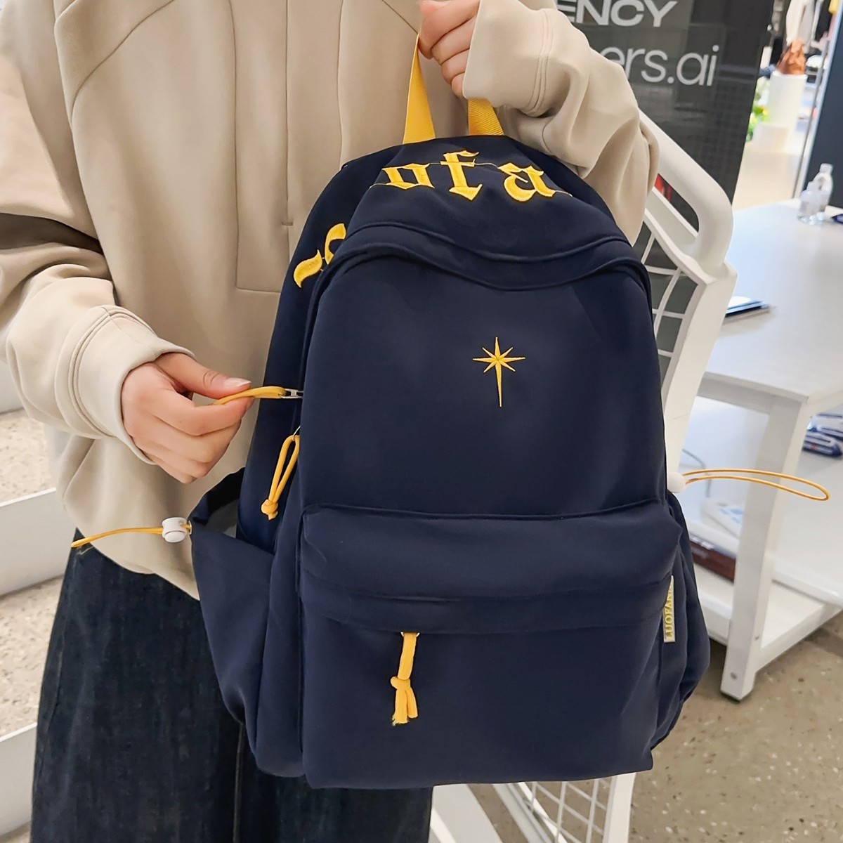 藏青晴湾芒星立绣书包学生党美式图片