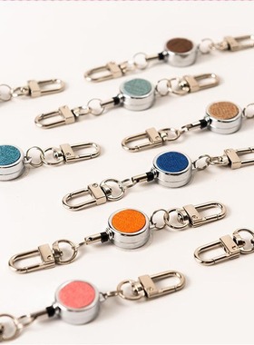 Anti fall and anti loss retractable buckle stretchable keych