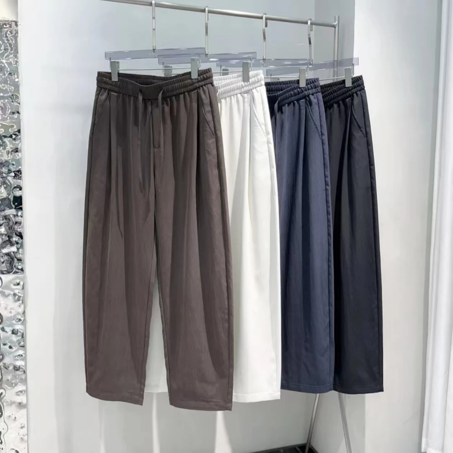 春季新款简约运动风直筒休闲裤男士时尚都市透气百搭松紧腰长裤潮