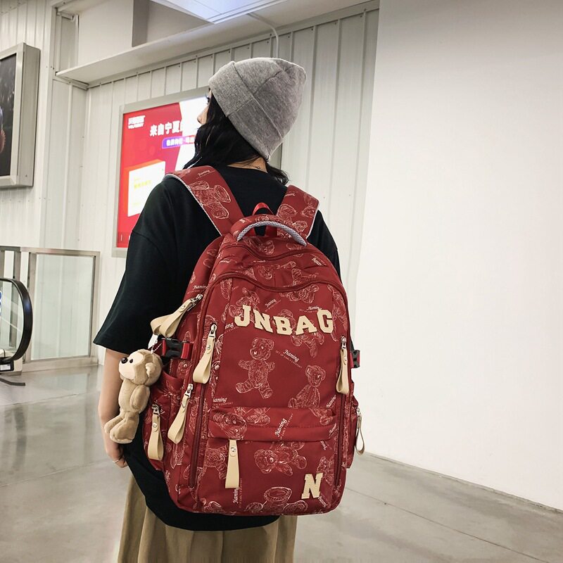 史努比官网书包男高中生大容量旅行背包女大学生涂鸦电脑双肩包