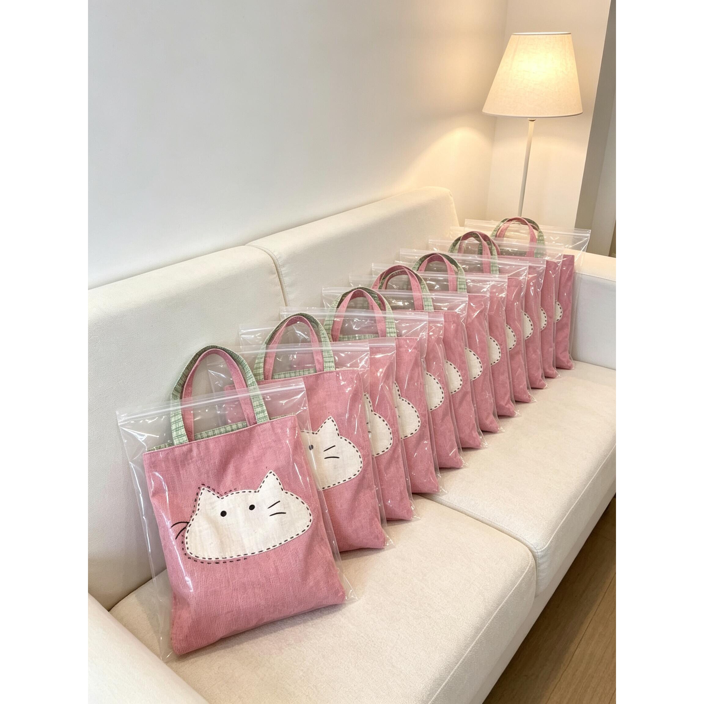 可爱猫咪帆布包女款2026新款大容量上班通勤手提单肩包手拎包百搭