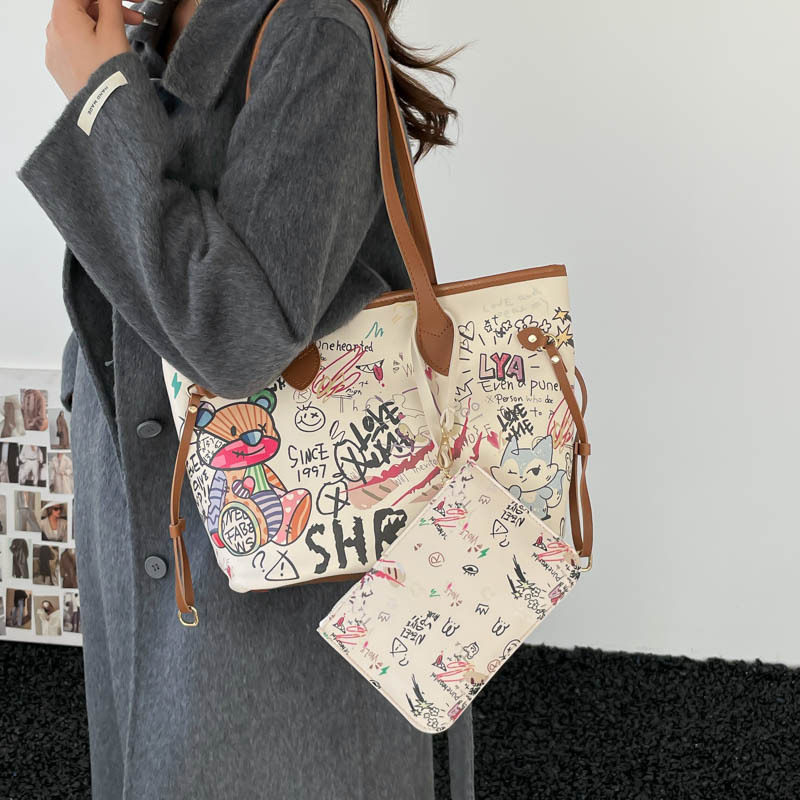 个性涂鸦复古托特包大容量2026春季新款女士时尚简约潮流单肩大包