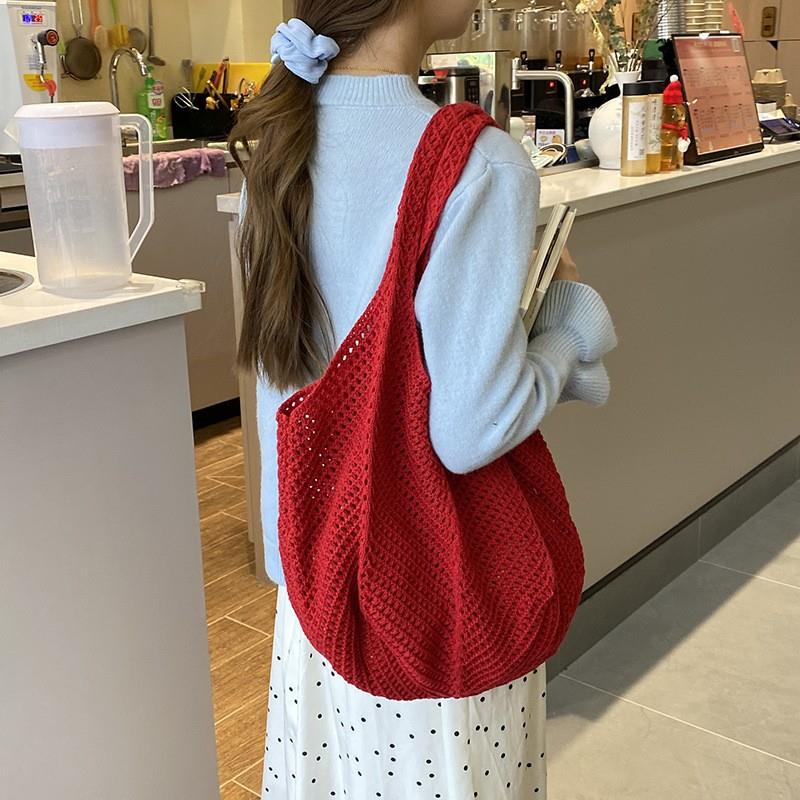 夏季流行新款编织袋女式手提式编织袋时尚单肩网眼袋海边旅游稻草