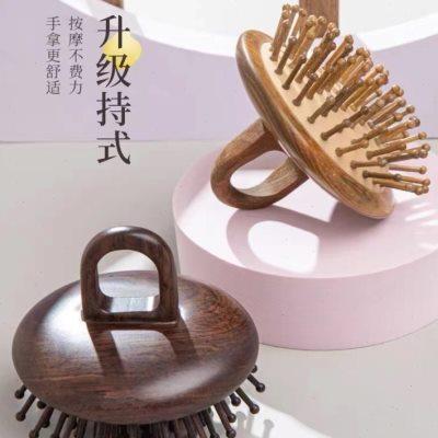 【卖檀翁】天然黑檀木荷花齿气垫梳 不挂发指环气囊无静电按摩梳
