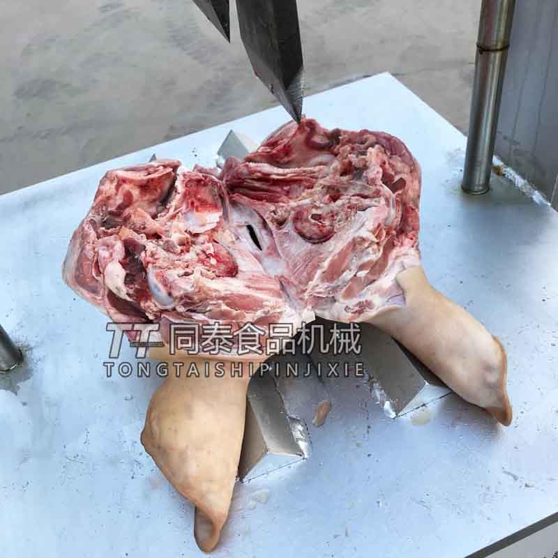 液压式冻猪头鲜猪头劈半机大型劈牛头机器