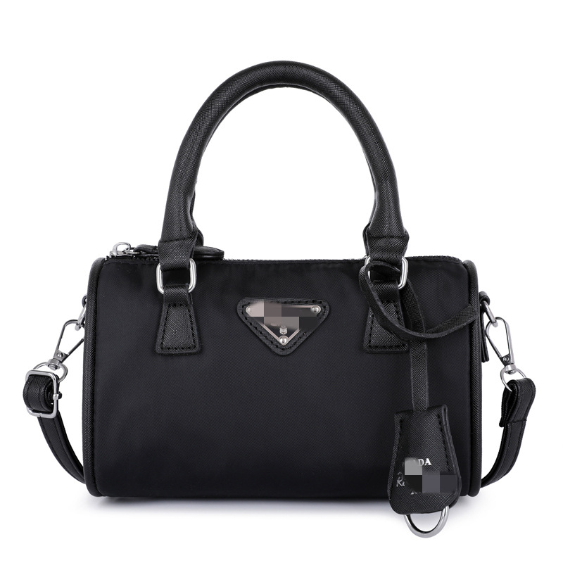 P家圆桶尼龙女包斜挎手提单肩包新款爆款网红休闲hopo包桶包