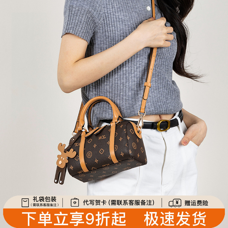 天美意老花手提包女2025新款单肩斜跨包通勤腋下包枕头包波士顿包