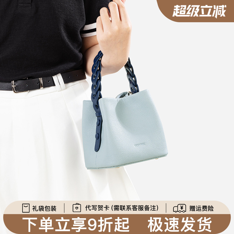 天美意真皮水桶包女2025新款夏天百搭大容量手提包通勤休闲斜挎包
