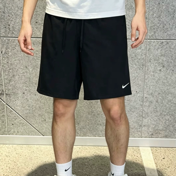 Nike/耐克黑色短裤纯色休闲通勤舒适中腰五分裤运动裤男款fn2999图片