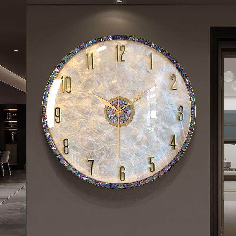 轻奢贝壳挂钟2024高级感创意挂表时钟表挂墙2023新款客厅高档大气