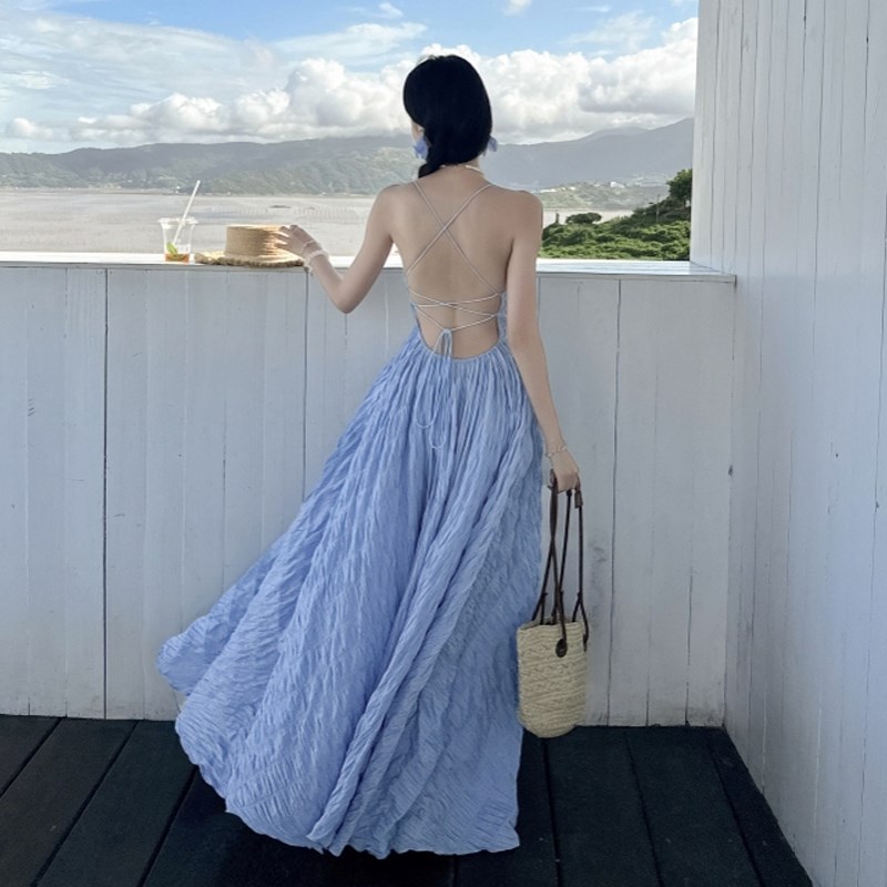 速发超仙白色性感露背吊带连衣裙夏季法式高级感系带度假拍照大摆