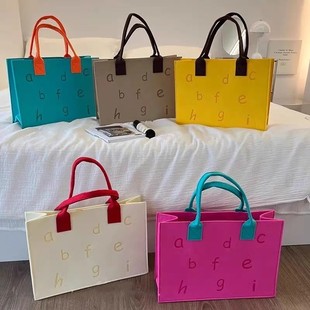 包包夏季女2024上班出勤防水耐脏英文字母毛毡包手拎包高级感现货