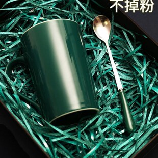 gift lined with shredded paperC filling, colored packing box