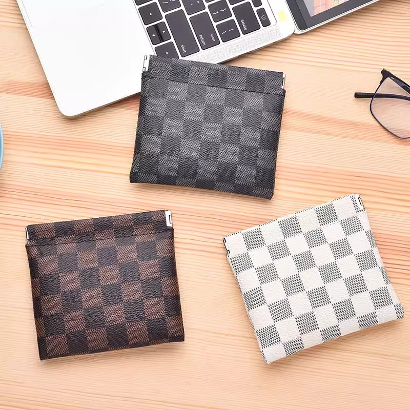 新款自动闭合弹片收纳包迷你小包女士便携式口红化妆包女生高颜值