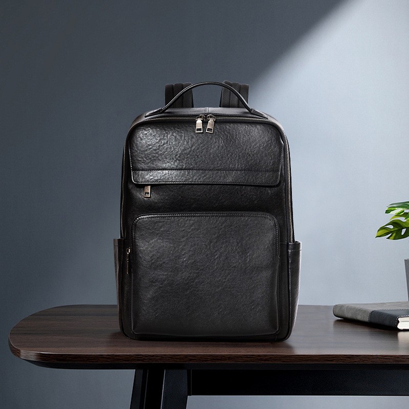 牛皮新款商务简约双肩背包旅行包