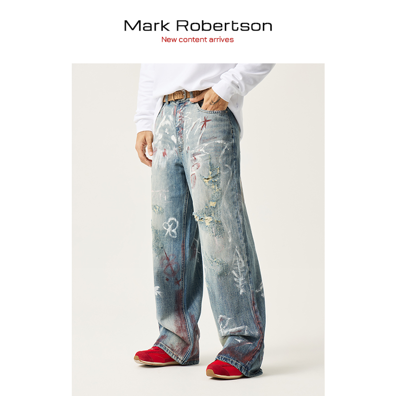 手绘蓝色水洗做旧牛仔裤