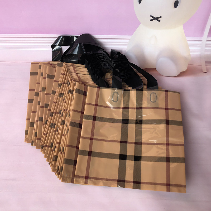 好货定制化妆品手提袋服装店杏格子塑料袋包袋商用购物袋大简约打