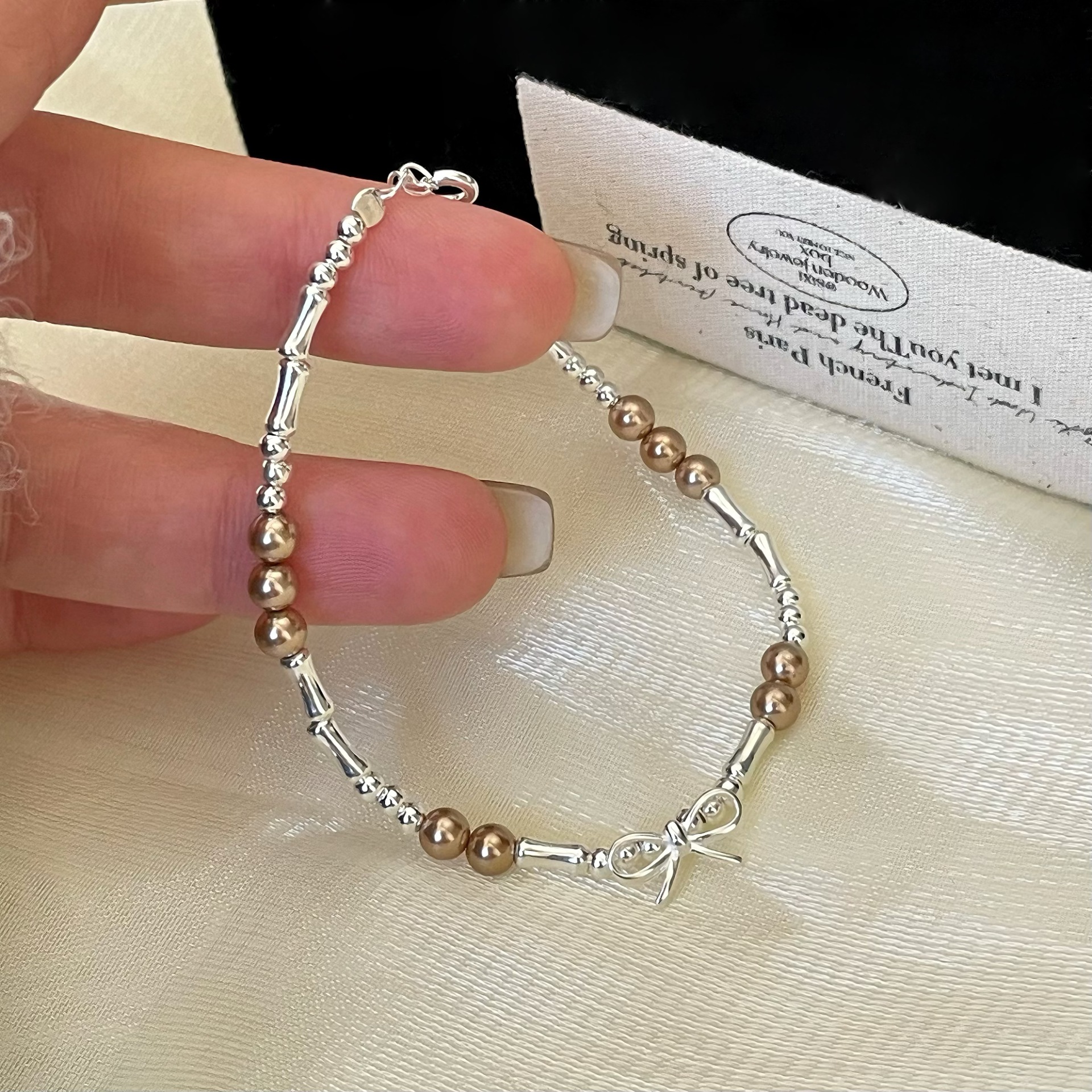 纯银日韩蝴蝶结珍珠手链