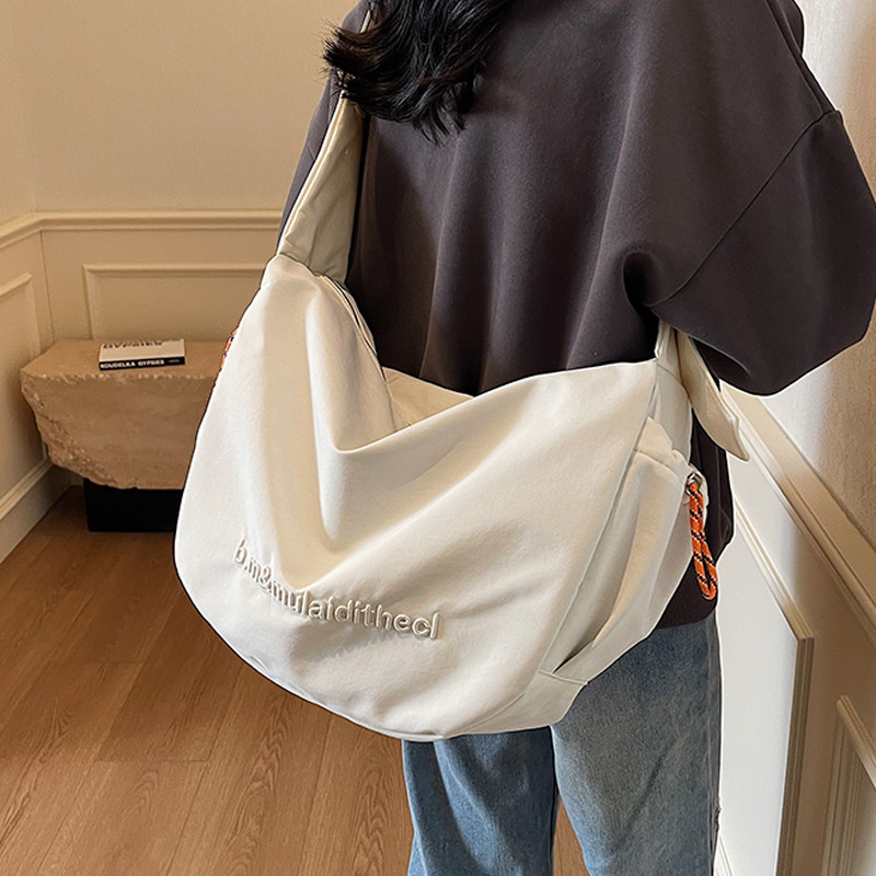 品牌撤柜宽肩带包包女款2025通用款女包