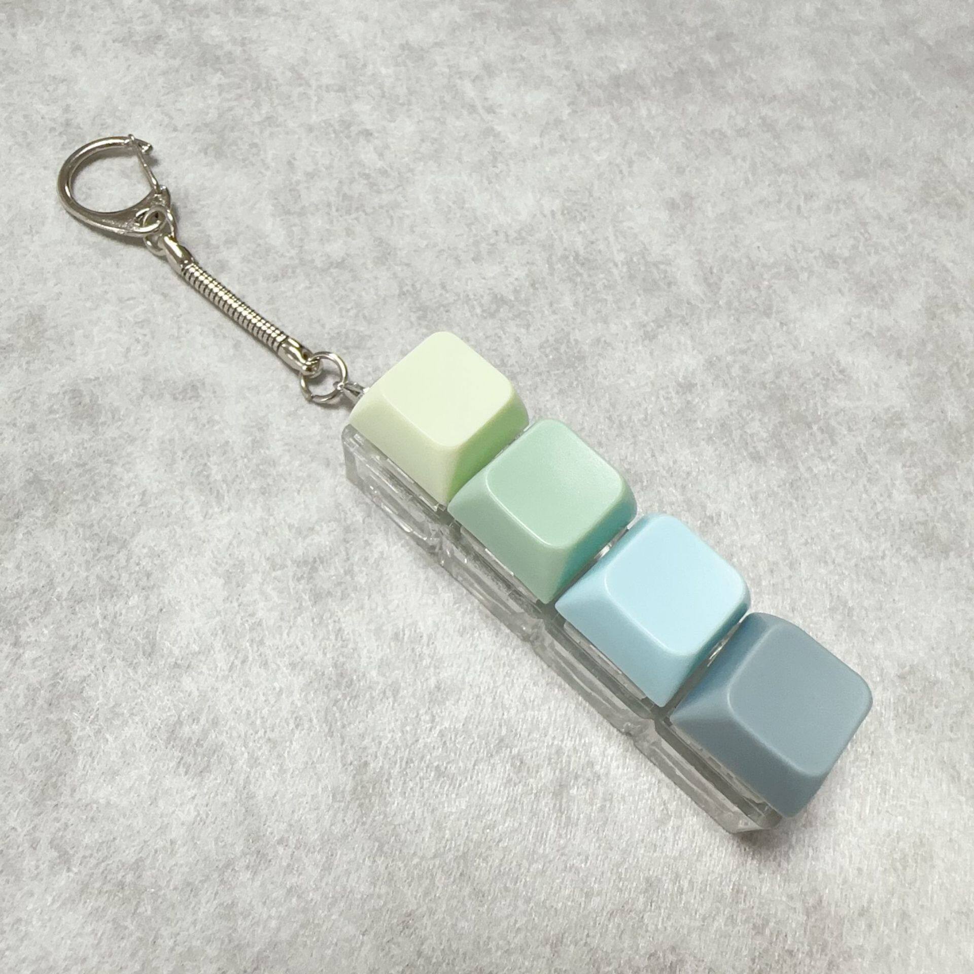 跨境4键马卡龙解压按键小玩具发泄手指减压玩具键盘挂件钥匙扣