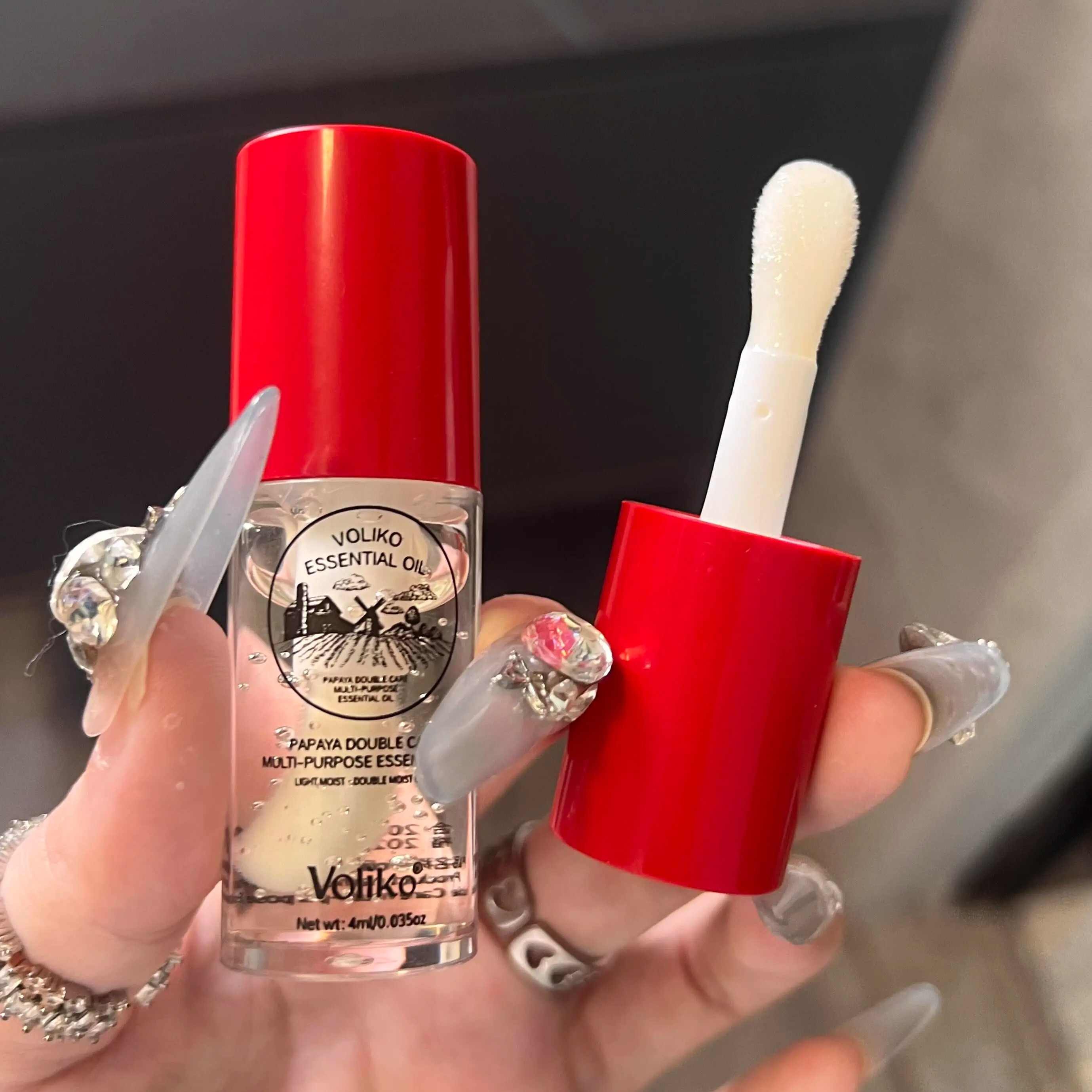 正品番木瓜唇部精华油唇油保湿滋润淡化唇纹木瓜倍护多用润唇膏