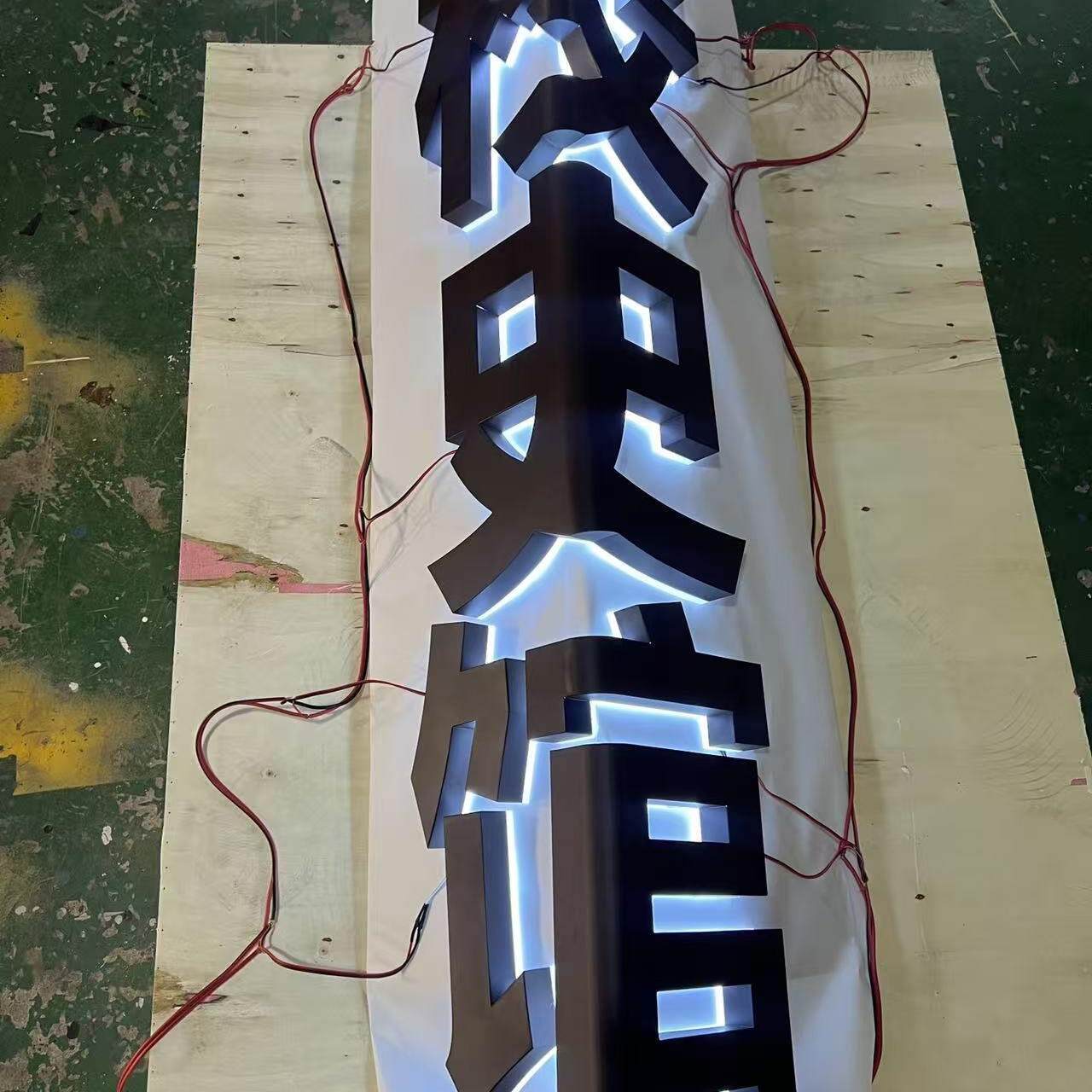 不锈钢头发光转角弧形字招牌门墙角拐弯字凳板字广告景观字三维字
