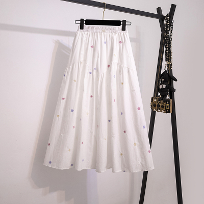 高级感白色甜美刺绣碎花半身裙女秋冬高腰a字百褶中长款大摆伞裙