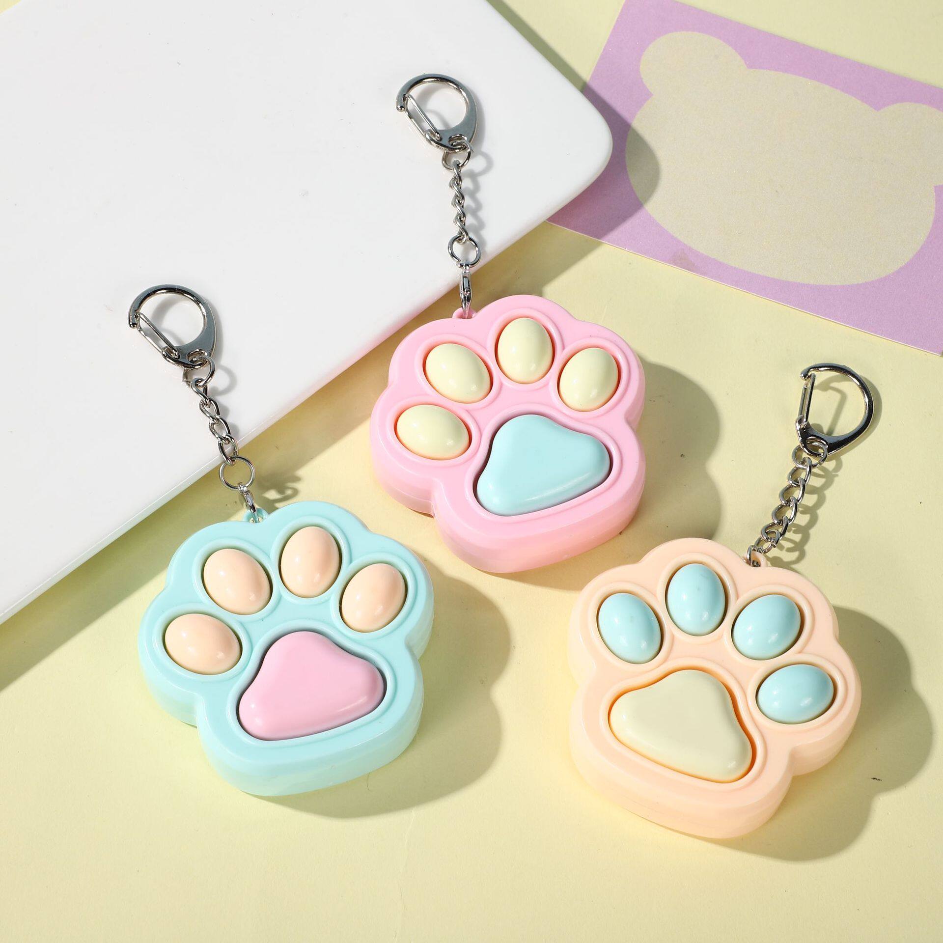卡通猫爪按键解压玩具钥匙挂件包图片
