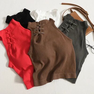 Irregular retro high neck hollowed out top不规则高领镂空上衣