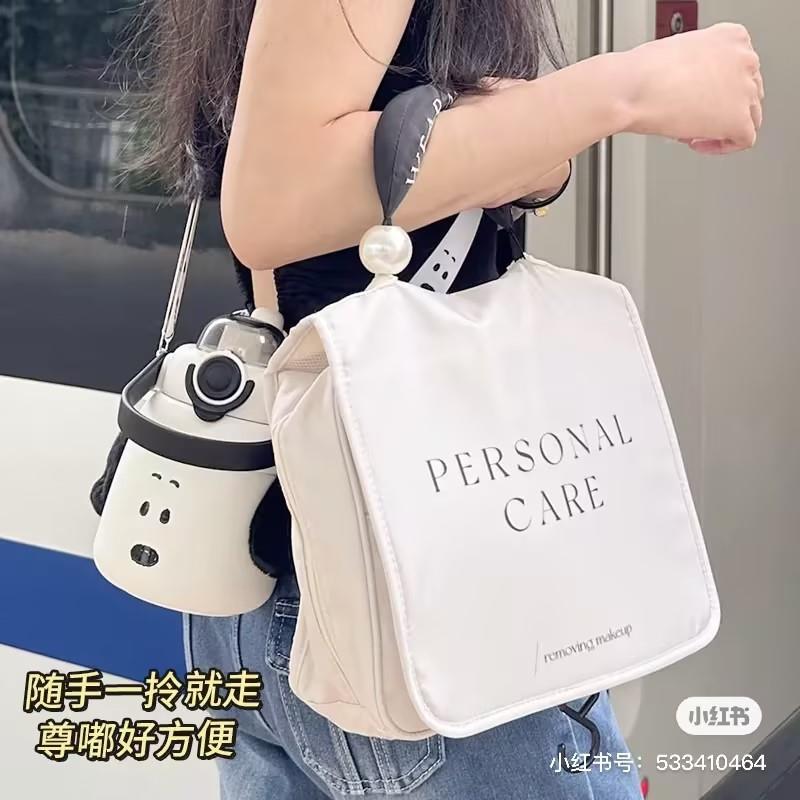 化妆包女2024新款便携高级感手提大容量出差旅行化妆品收纳洗申恒