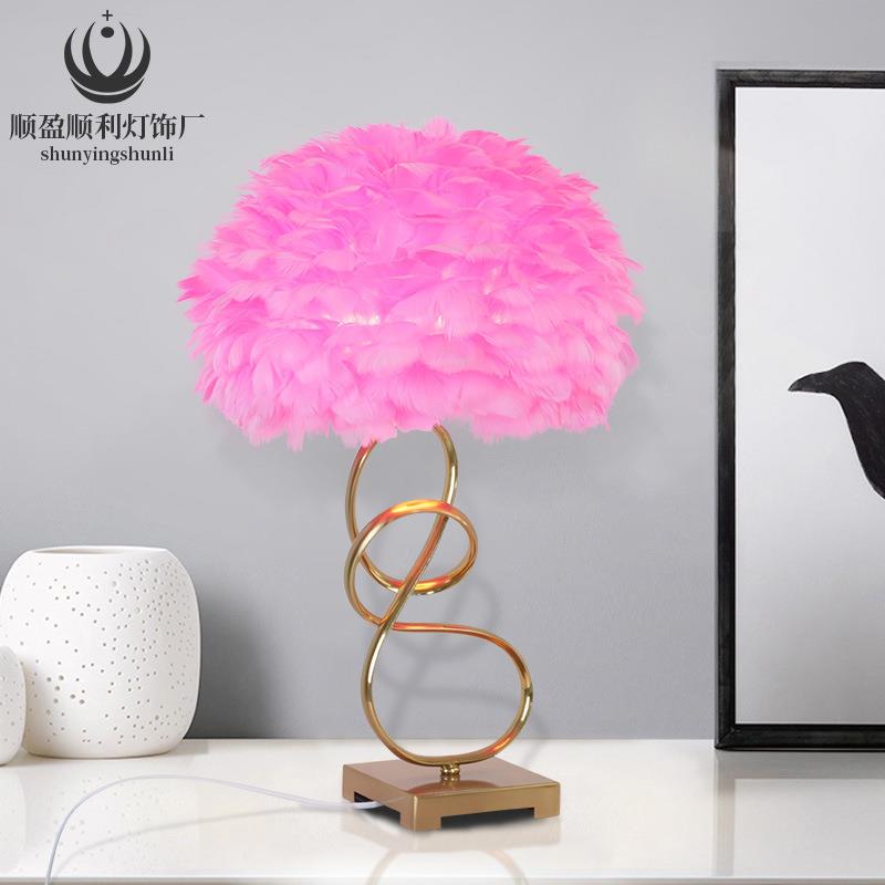 北欧创意羽毛台灯铁艺灯体卧室床头灯现代简约客厅书房纽纹台灯