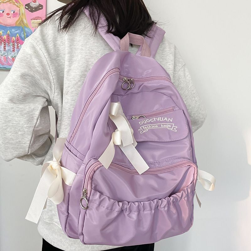 日系mv4l5y动漫网红结背包生可爱撞色蝴蝶高众颜值韩版小学双肩包