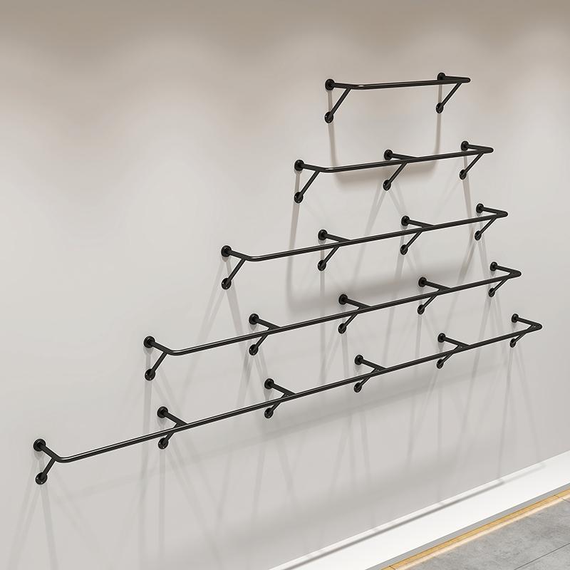 服装店上墙展示架现代简约黑色不锈钢V型挂衣架陈列架壁挂货架
