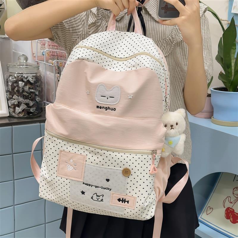 可爱猫咪波点双肩包女学生校园大容量轻便日常揹包高颜值学生书包
