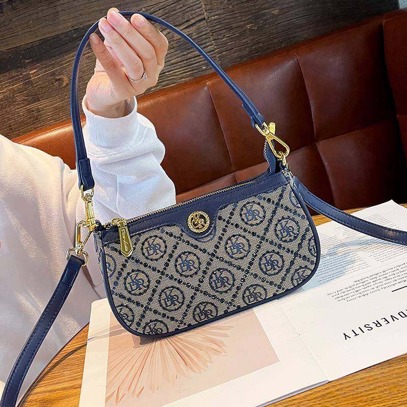 轻奢时尚高级感小众设计腋下包女士2025新款潮帆布斜挎单肩马鞍包