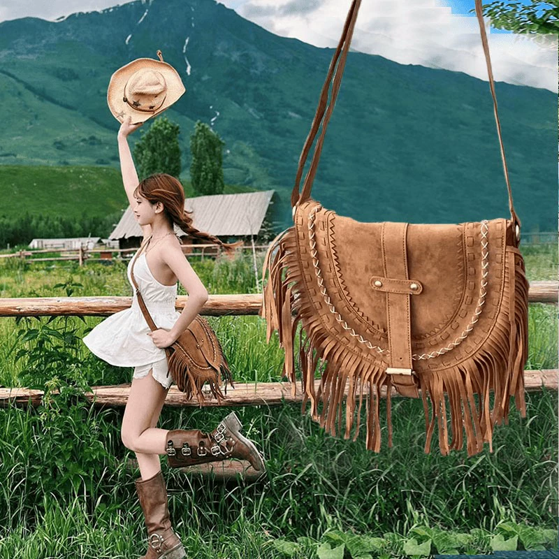 草原旅行流苏包女斜挎马鞍包包