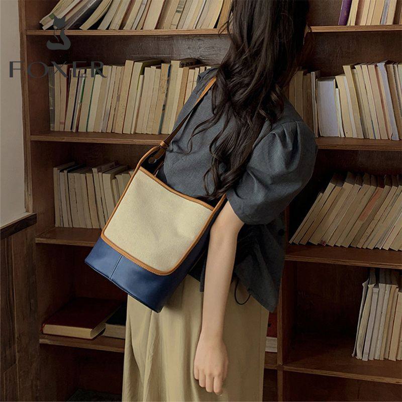 金狐狸包包女包2025新款帆布水桶包大容量小众时尚撞色单肩斜挎包,箱包皮具/热销女包/男包,手提箱,淘宝优惠券,粉丝福利购,淘宝优惠卷