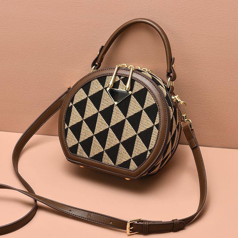 简约韩系休闲单肩斜挎手提小圆包包女2025新款时尚百搭外出高颜值,箱包皮具/热销女包/男包,手提箱,淘宝优惠券,粉丝福利购,淘宝优惠卷