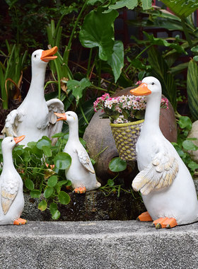 户外花园庭院卡通举牌鸭子玻璃钢雕塑幼儿园装饰创意个性花盆摆件