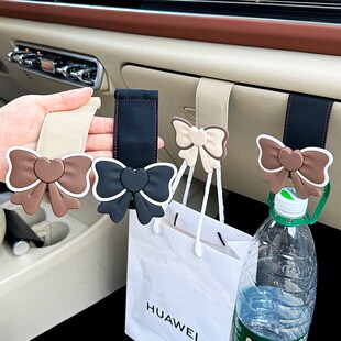 速发可爱蝴蝶结车载挂钩汽车箱排副驾用手套前多功能收纳置物驶品