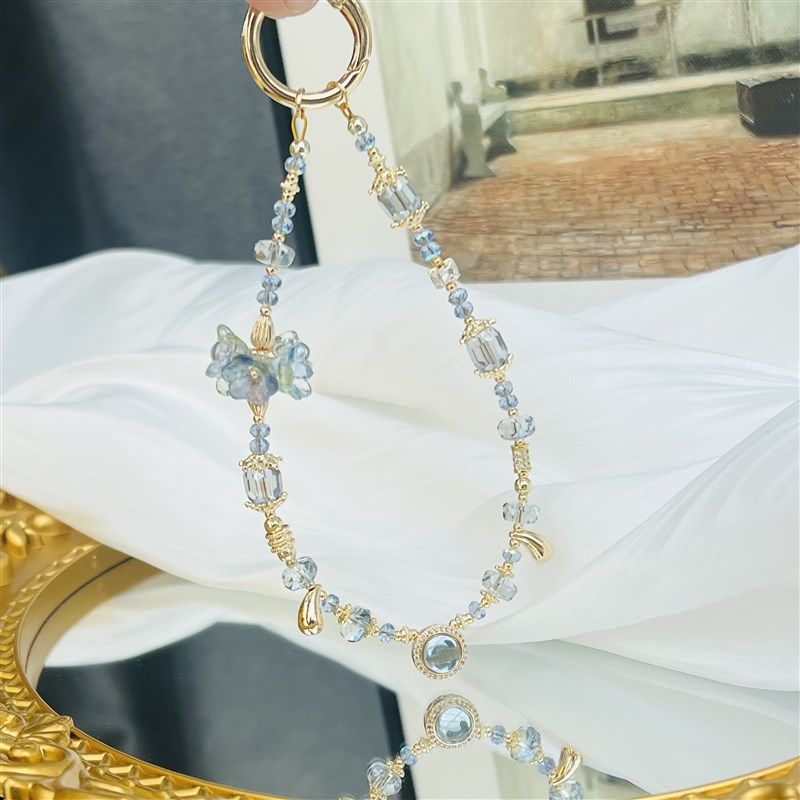 海蓝宝手机链女挂手腕水晶挂绳挂链2025年新款轻奢小众精致手机绳