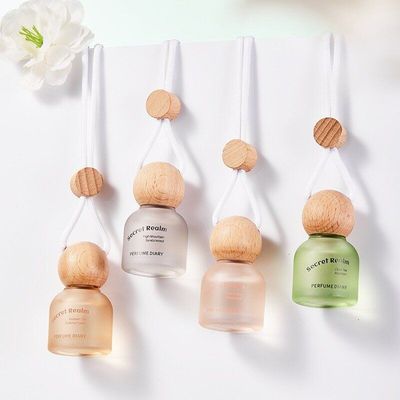 正品高级感清新挂件香精油车载香氛批发持久车内饰日记香水汽留香