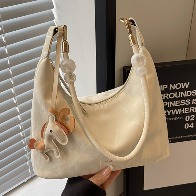 高级感轻奢小众包包女新款时尚韩版大容量通勤斜挎饺子腋下包